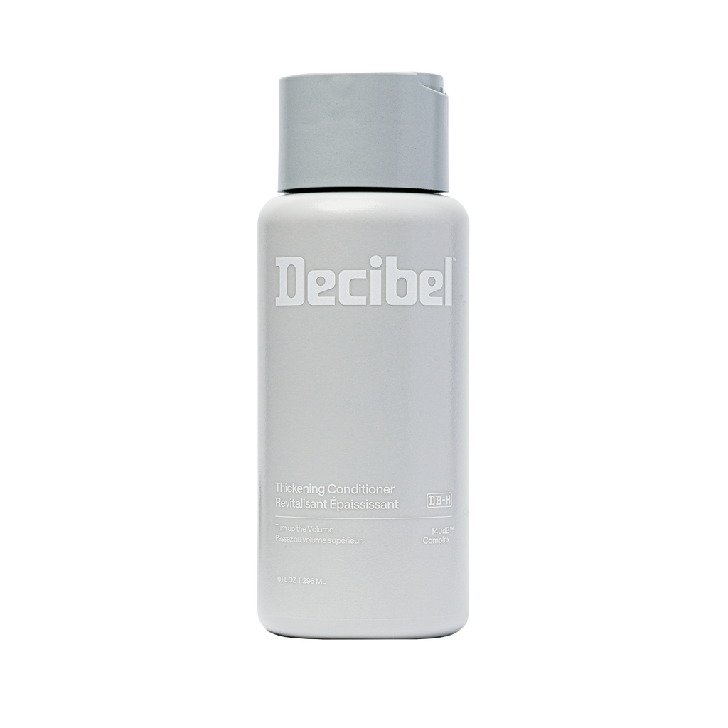 Thickening Conditioner van Decibel, lichtgrijze flacon met wit logo