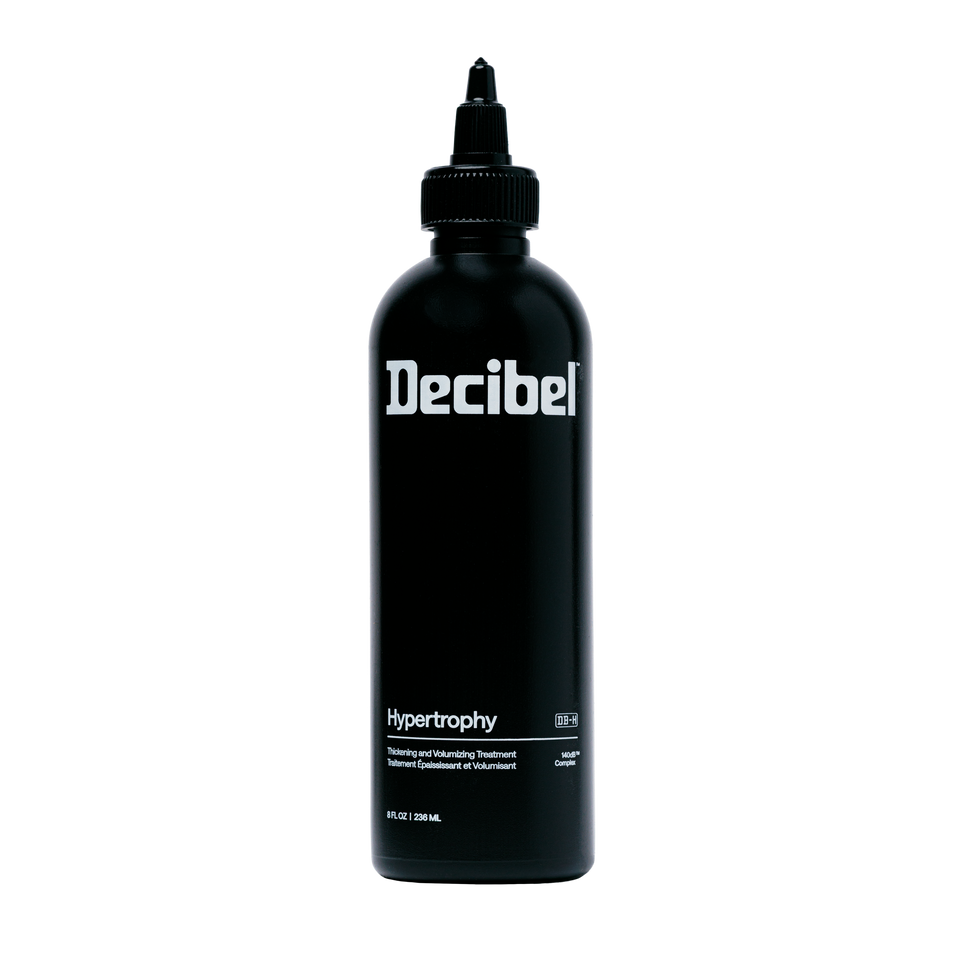 Hypertrophy Thickening and Volumizing Treatment van Decibel, zwarte flacon met fijne tuit