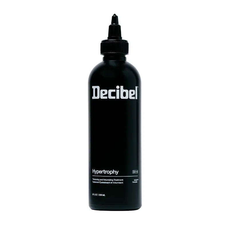 Hypertrophy Thickening and Volumizing Treatment van Decibel, zwarte flacon met fijne tuit