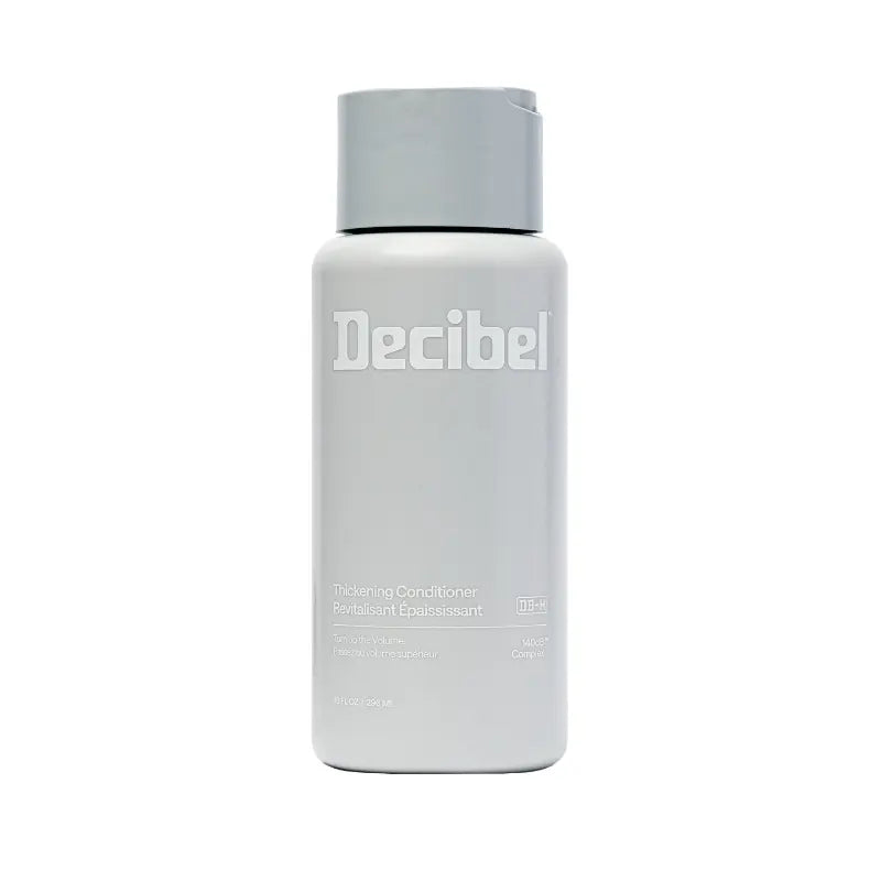Thickening Conditioner van Decibel, lichtgrijze flacon met wit logo