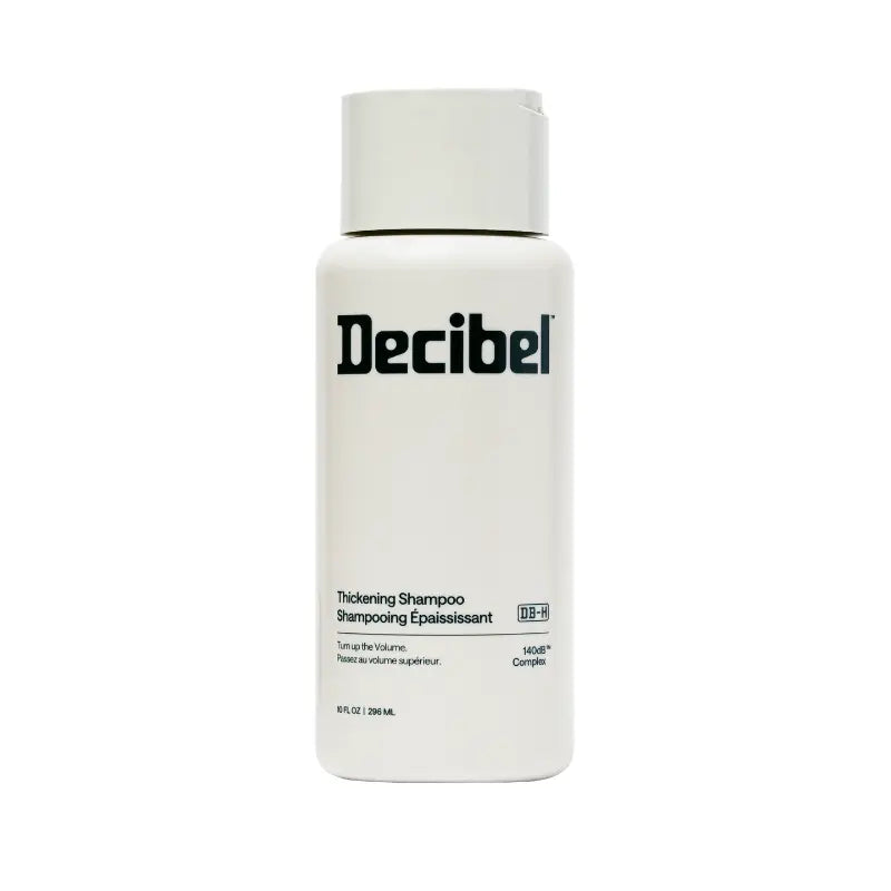 Thickening Shampoo van Decibel, witte flacon met zwart logo